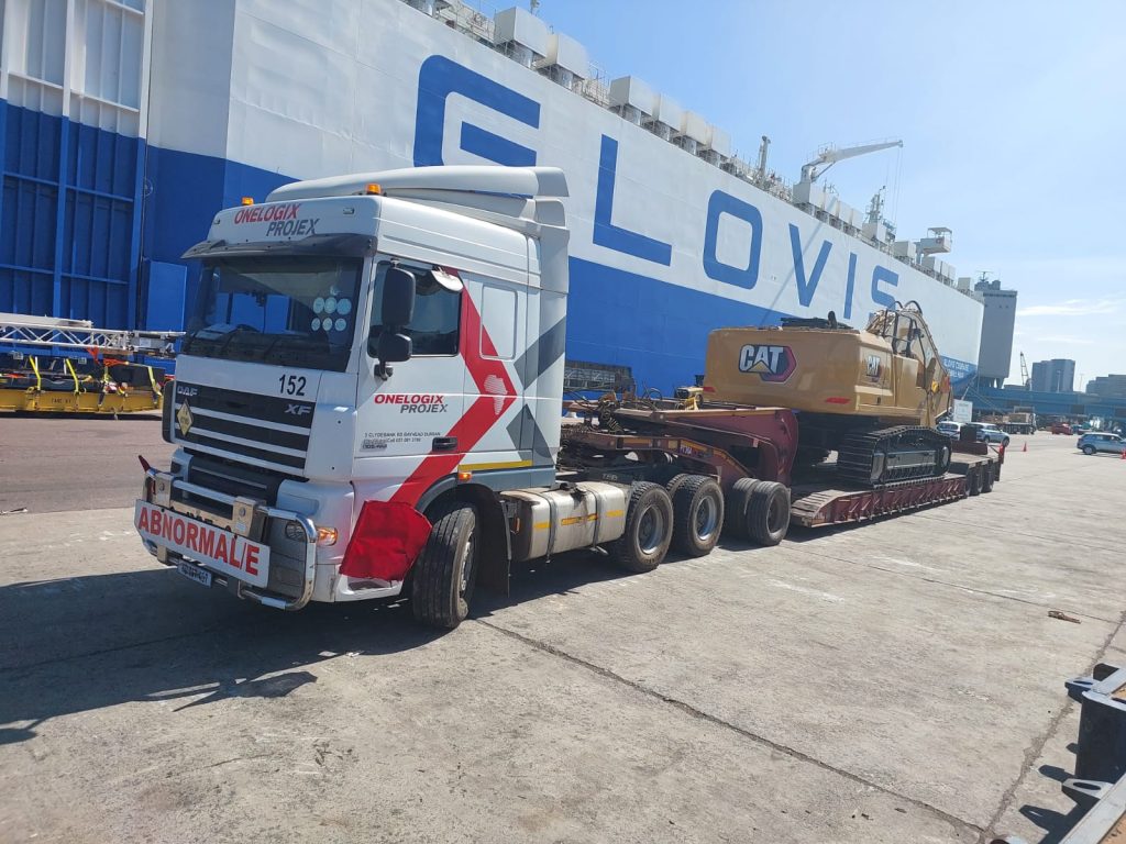 Abnormal load haulage truck transporting oversized mining equipment in South Africa.
